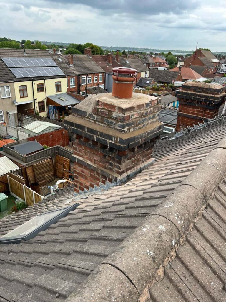 This is a photo taken from a roof which is being repaired by Horndean Roofing Repairs, it shows a street of houses, and their roofs